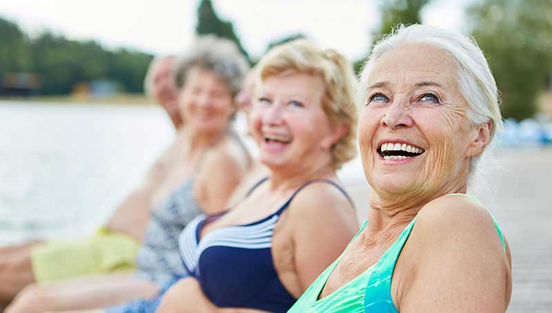 senior women enjoying life after a chiropractic adjustment from a Irvine Chiropractor at DiSiena & Irvine Chiropractic, Brain Wellness, and Nutrition