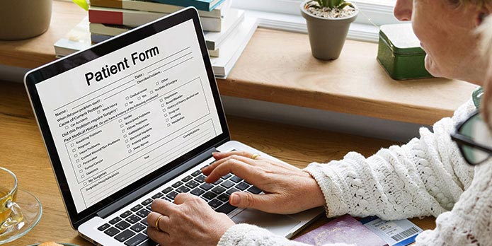 new patient of DiSiena & Irvine Chiropractic, Brain Wellness, and Nutrition filling out forms online before his appointment