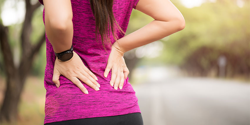 patient needing back pain chiropractor in Irvine