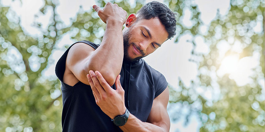 patient needing elbow pain chiropractor in Irvine