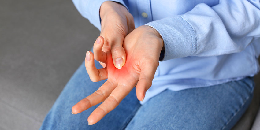 patient needing trigger finger chiropractor in Irvine