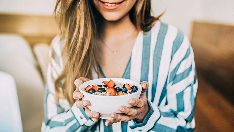 patient eating healthier after receiving advice from a Irvine Chiropractor at DiSiena & Irvine Chiropractic, Brain Wellness, and Nutrition